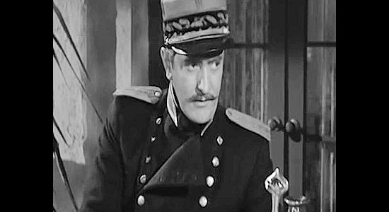 Robert Tafur as Col. Aguilar, the man trying to enforce the law in San Sebastian in The Three Outlaws (1956)