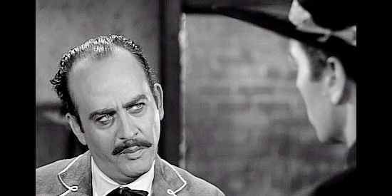 Rodolfo Hoyos Jr. as Col. Emilio, a Mexican official cooperating with Matt Sloane in Toughest Gun in Tombstone (1958)