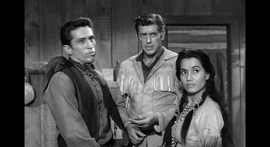 Ron Soble as Pawnee, James Brown as Wayne Santley and Connie Buck as Coheela, reacting when a stolen broach gives away the true identity of Brad Santley and his gang in Gun Fight (1961)