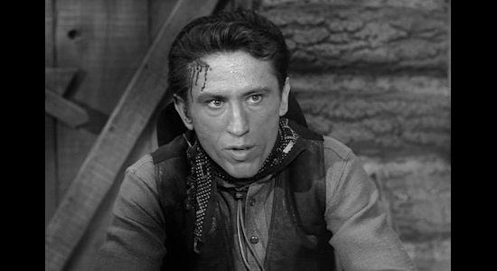 Ron Soble as Pawnee, trying to convince Brad Santley that his brother has turned on him to collect a reward in Gun Fight (1961)