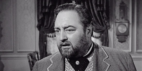 Sebastian Cabot as Ed McNeil, the rich man determined to gobble up all the oil-rich land around Prairie City in Terror in a Texas Town (1958)