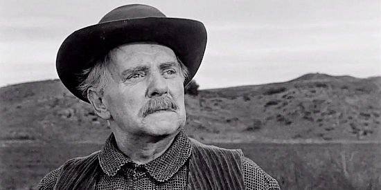 Ted Stanhope as Swen Hansen, ready to stand up against McNeil's hired gun in Terror in a Texas Town (1958)
