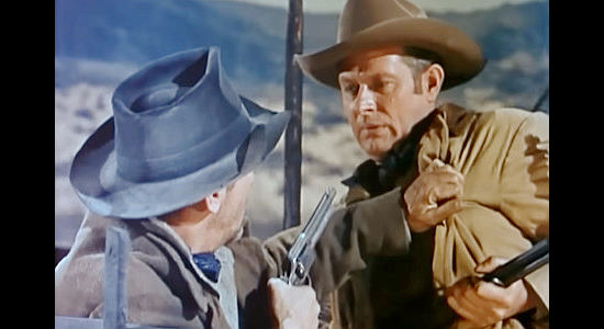 Vaughn Monroe as Matt Landry, tussling with Frank Girard in Toughest Man in Arizona (1952)