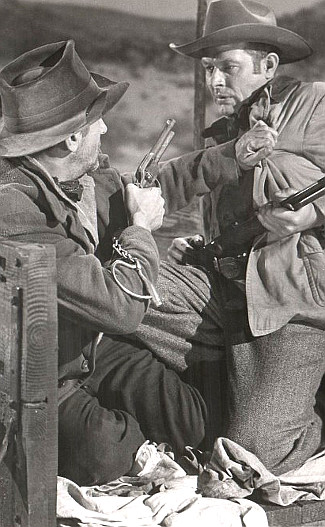 Victor Jory as Frank Girard and Vaughn Monroe as Matt Landry scramble for the upper hand in Toughest Man in Arizona (1952)