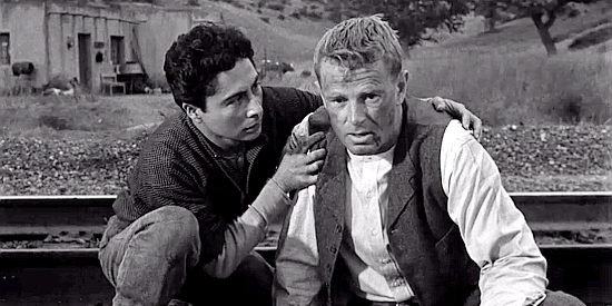 Victor Millan as Jose Mirada with George Hansen (Sterling Hayden) after he's been escorted out of Prairie City in Terror in a Texas Town (1958)