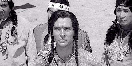 X Brands as Running Cloud, Buffalo Horn's son, promising war if his father is put to death in Oklahoma Territory (1960)