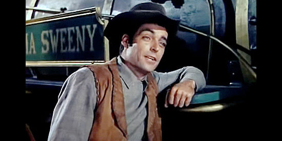 Rory Calhoun as Dakota, the smooth-talking Dawson henchmen who joins the expedition to Tomahawk in A Ticket to Tomahawk (1950)