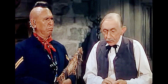 Will Wright as Marshal Dodge asking Pawnee (Chief Yowalachie) to keep the guys away from Kit in A Ticket to Tomahawk (1950)