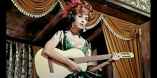 Adriana Ambesi as Rosie, the saloon girl singing another of her sad songs in A Stranger in Paso Bravo (1968)
