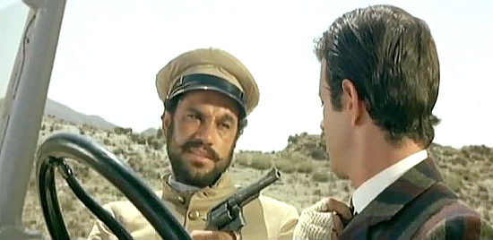 Aldo Sambrell as the Mexican captain turns the tables on Brown (Mark Damon) in Train for Durango (1968)