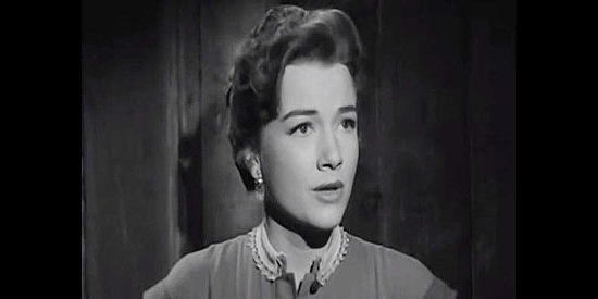 Anne Baxter as Cal, warning her fellow travelers of Ryker's vicious nature in The Outcasts of Poker Flat (1952)