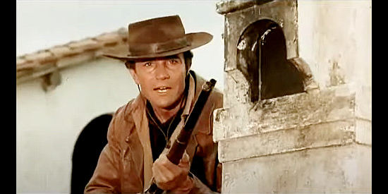 Anthony Steffen as Gary Hamilton, prepared for a final showdown with Acombar in A Stranger in Paso Bravo (1968)