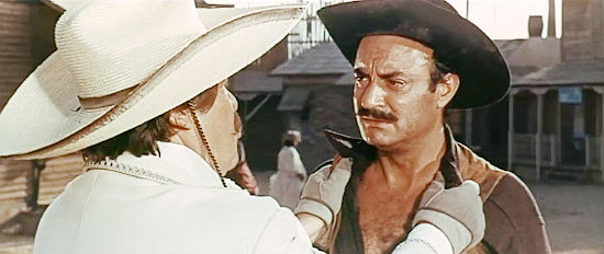 Antonio Almoros as Sheriff Coleman, taking instructions from Rodriguez in Seven Guns for Timothy (1966)