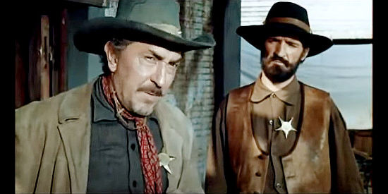 Antonio Cintado as the sheriff with his deputy, wondering whether to side with Gary Hamilton in A Stranger in Paso Bravo (1968)