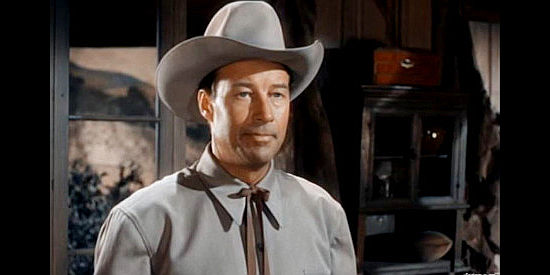 Bill Elliott as Frank Plummer, coming to understand Kate Foley's motives in The Last Bandit (1949)