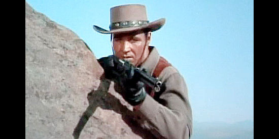 Chris Alcaide as Jason, henchmen for the men trying to re-route the railroad, waiting in ambush in Overland Pacific (1954)