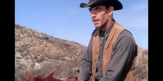 Clem Fuller as Dixie, rider on the Davis ranch suspicious of Cooncat in High Lonesome (1950)
