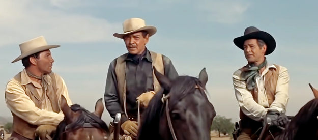 Clint Allison (Cameron Mitchell), Ben Allison (Clark Gable) and Nathan Stark (Robert Ryan) discuss how to deal with Jayhawkers in The Tall Men (1955)