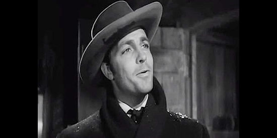 Dale Robertson as John Oakhurst, the gambler who bets against the odds to help strangers in The Outcasts of Poker Flat (1952)