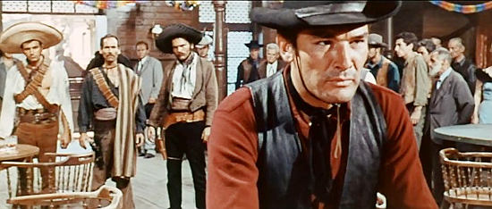 Daniel Martin as Slim has trouble approach in the form of three Rodriguez henchmen in Seven Guns for Timothy (1966)