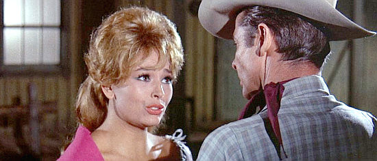 Diana Lorys as Kit O'Neal in a disagreement with Jess Carlin (Audie Murphy) in The Texican (1966)