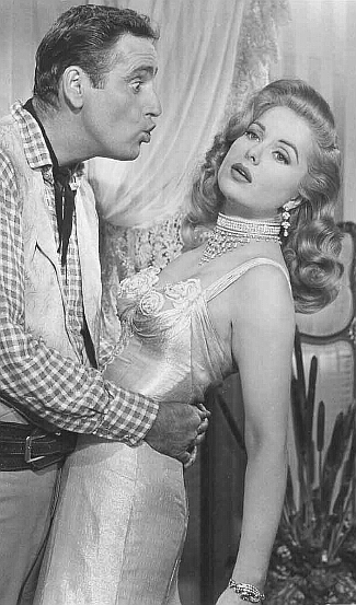 Dick Martin as Doc Logan and Martha Hyer as Amity Babb in Once Upon a Horse (1958)