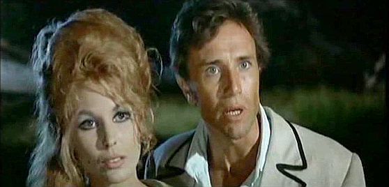 Dominique Boschero as Helena and Anthony Steffen as Gringo as stunned by the sudden appearance of an ally in Train for Durango (1968)