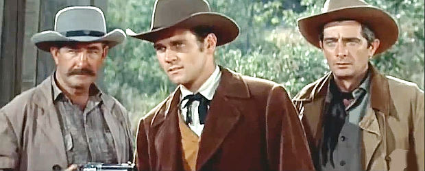 Don Murray as Lat Evans, prevented from helping a friend by Jehu's companions in These Thousand HIlls (1959)