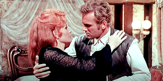 Erika Blanc as saloon owner Joanne has Durango (Tab Hunter) right where she wants him in Shotgun (1968)