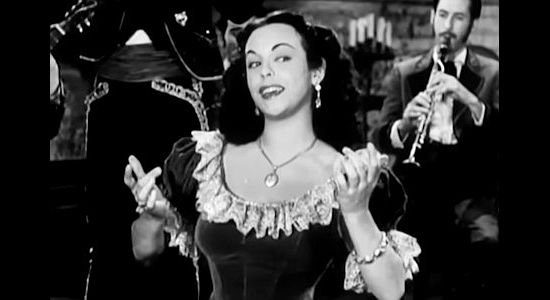 Estelita Rodriguez as Estelita Del Rey, always flirtaceous and smitten with Johnny Morrell in Old Los Angeles (1948)
