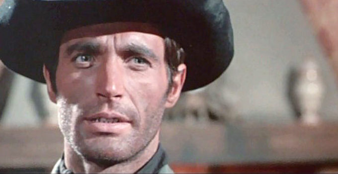 Gabriel Tinti as Jeff Tracy, confronting the man he thinks killed his father in Son of Django (1967)