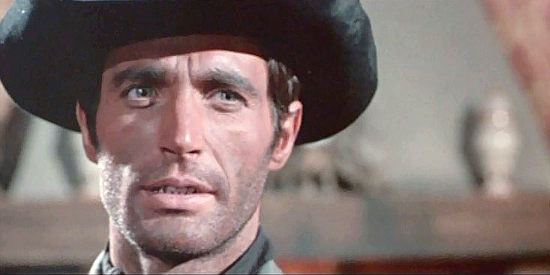 Gabriel Tinti as Jeff Tracy, confronting the man he thinks killed his father in Son of Django (1967)