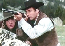 George Martin as Clint Harrison decides it's time to take up the gun again while Bill O'Brien (Gerhard Riedmann) looks on in Clint, the Nevada's Loner (1967)