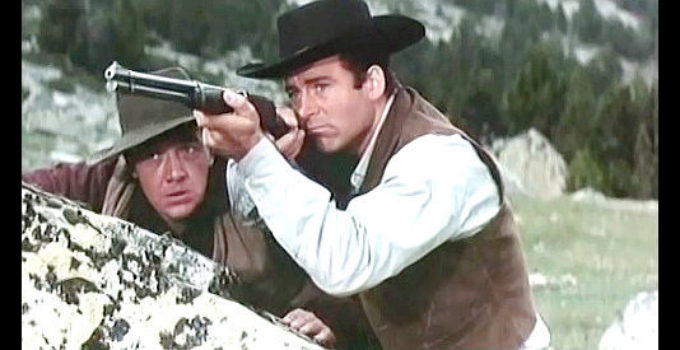 George Martin as Clint Harrison decides it's time to take up the gun again while Bill O'Brien (Gerhard Riedmann) looks on in Clint, the Nevada's Loner (1967)