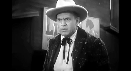 George Pembroke as Jed, incensed when an outlaw wants to 'steal' his prized Appaloosa in a one-sided trade in Hell Canyon Outlaws (1957)