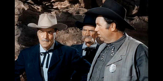 Jack Holt as Mort Pemberton, a railroad man suspicious of Frank Plummer in spite of reassurances from Casey (Andy Devine) in The Last Bandit (1949)