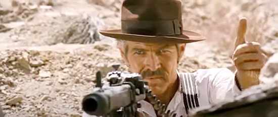 James Coburn as John Mallory, giving the thumbs up to go ahead with an attack on advancing government troops in A Fistful of Dynamite (1971)