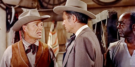James Millican as Cal Prince, hired gun, with Maj. Linton Cosgrave (Jim Davis), the man he works for in The Outcast (1954)