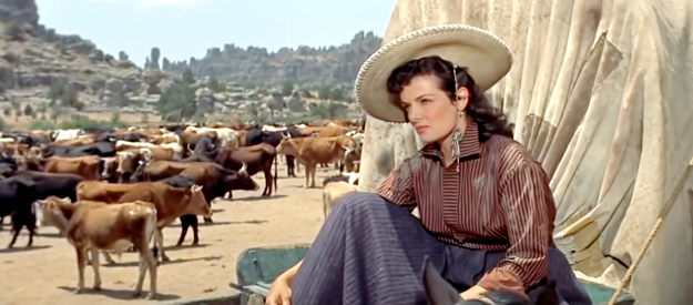 Jane Russell as Nella Turner, wondering if the Sioux will bring a premature end to a cattle drive in The Tall Men (1955)