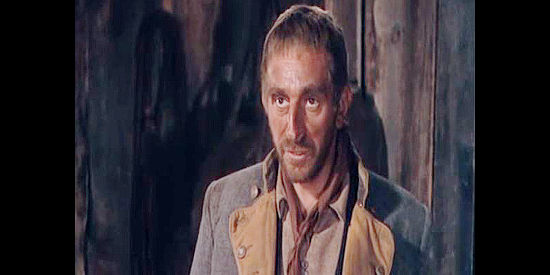 Jeff Corey as Sgt. Keely, the Quantrill man planning the attack on Don Antonio Chaves's caravan in The Outriders (1950)