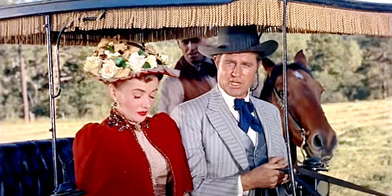 Jim Davis as Maj. Linton Cosgrave with Catherine McLeod as Alice Austin in The Outcast (1954)