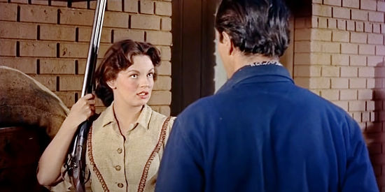 Joan Evans as Judy Polsen, after saving Jet Cosgrave from a bushwacking in The Outcast (1954)