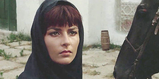 Jolanda Modio as Chica, the village woman in A Stranger in Town (1966)