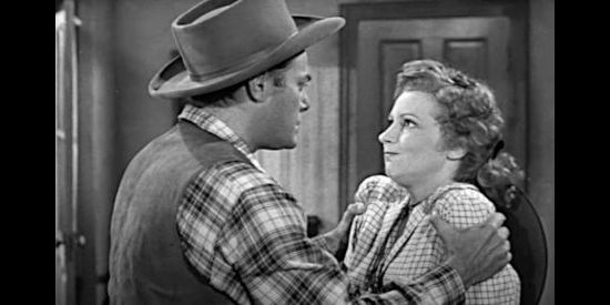 Jon Hall as Ed Garry, getting forceful with Claire Benton (Julie Bishop) in Deputy Marshal (1949)