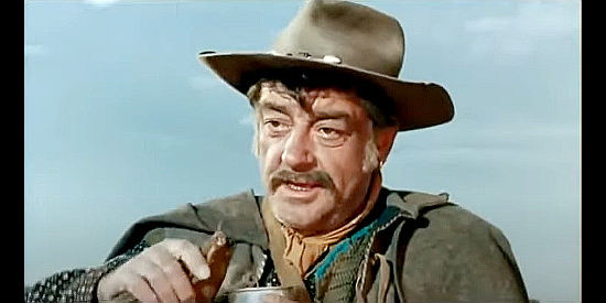 Jose Calvo (Pepe Calvo) as the peddler who befriends Gary Hamilton in A Stranger in Paso Bravo (1968)