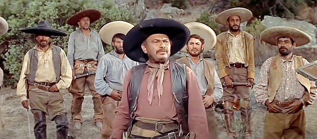 Juan Garcia as Luis, leader of Ben Allison's loyal group of vaqueros in The Tall Men (1955)