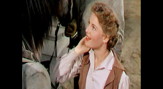 Judith Braun as Sally Eaton, the gal who's been infatuated with Dan Hammond since childhood, but is willing to give his brother Neil a chance to change her mind in Horizons West (1952)