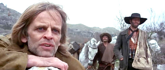 Klaus Kinski as outlaw leader Dan Hogan, eager to see the border in Shoot the Living ... Pray for the Dead (1971)
