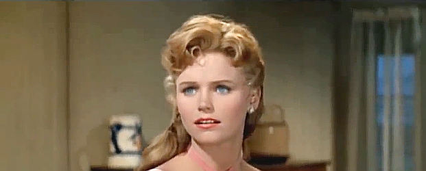 Lee Remick as Callie, the saloon girl Lat Evans falls for in These Thousand Hills (1959)