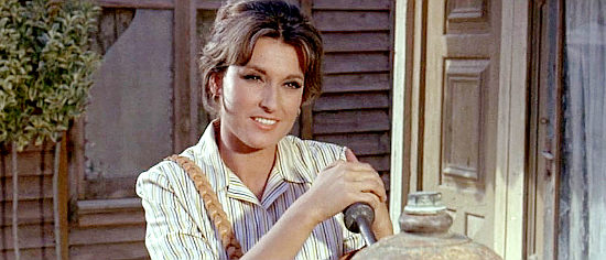Luz Marquez as Sandy Adams, the cattlewoman, leather worker who was engaged to Jess's brother in The Texican (1966)